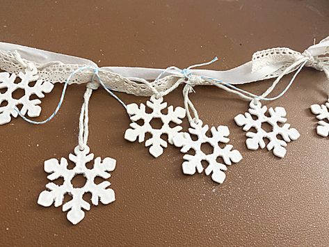 DIY lace snowflake garland Wooden Snowflake Garland, Snowflake Garland Diy, Winter Garland Diy, Fabric Strip Garland, Relief Society Christmas, Easy Snowflake, Lace Garland, Winter Garland, Simple Snowflake