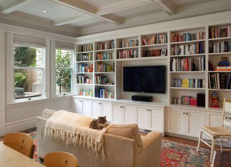 This is a great way to integrate a flat screen TV into a living room. Anchoring it in a custom built in makes it look natural and part of the room Bookshelves With Tv, Traditional Family Room, Living Room Built Ins, Bookcase Design, Muebles Living, Home Library Design, Living Room Red, Living Room Shelves, Trendy Living Rooms