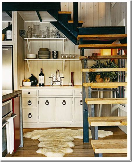 This sink area tucked under the open stairs feels very fall-at-a-cabin-in-Vermont to me. Ahh, fall. When the temperature is less than 97 degrees. Stair Nook, Lake House Kitchen, Cosy Kitchen, Kitchen New York, Space Saving Kitchen, Eclectic Kitchen, Renovation Design, Stair Storage, Cozy Kitchen