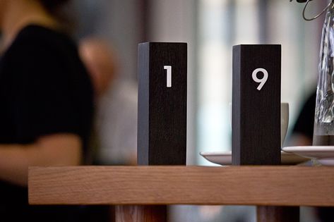 Table numbers - block of wood - stand alone Table Number Ideas Cafe, Cafe Table Number Ideas, Table Numbers For Restaurant, Table Numbers Cafe, Cafe Table Numbers, Table Numbers Restaurant, Restaurant Table Number Ideas, Table Numbering, Table Number Design