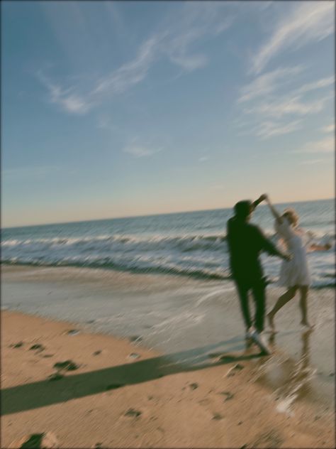 Film photo of couple on beach Beach Life Couple Aesthetic, Beach Wedding Aesthetic Couple, Couple Beach Shoot Ideas, Coastal Couple Aesthetic, Couples On Beach Aesthetic, Blurry Couple Pics Beach, Film Beach Wedding Photos, Couple Jumping Into Water, Couples Photoshoot Hawaii