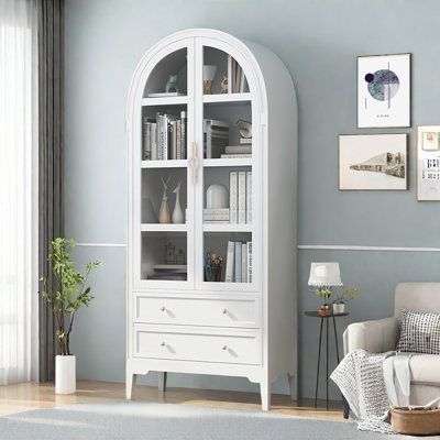 Features:Spefications:Dimensions:Assembly:Warranty: Color: White | GINATOL Simple Arched Glass Door Solid Wood Bookcase. 68.9 H x 29.5 W x 13.8 D in Wood in White | 13.8" L x 29.5" W x 68.9" H | Wayfair White Wood Bookcase, Dining Display, Solid Wood Bookcase, Bookcase White, Office Bookcase, White Bookcase, Wood Bookcase, Room Closet, Wood Glass