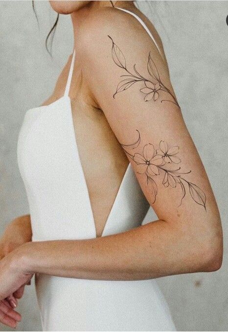 240+ Vine Tattoos For Guys and Females (2022) - TattoosBoyGirl Aries Female, Rosen Tattoo Frau, Tato Paha, Around Arm Tattoo, Wrap Around Tattoo, Tato Jari, Stylish Tattoo, Head Tattoo, Tato Lengan