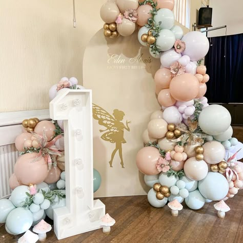 1st Themed Birthday Party Ideas, Fairy Theme Bday Party, Fairy Dust Birthday Party, Fairy Themed Birthday Decor, Fairies First Birthday Party, Fairy Pastel Birthday Theme, Fairy Birthday Party Balloons, Enchanted Forest Theme 1st Birthday, Fairies Theme Birthday Party