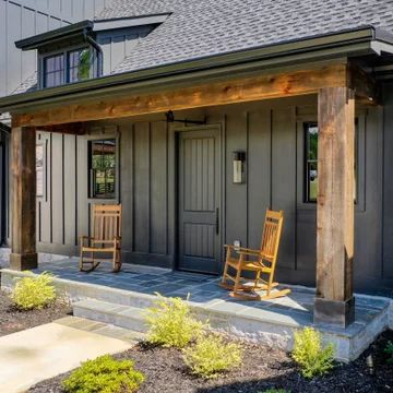 75 Beautiful Black Board and Batten Exterior Home Pictures & Ideas - July, 2021 | Houzz Board And Batten Exterior, Gray House, Cabin Exterior, Casa Exterior, Exterior Remodel, House Siding, House Design Photos, Inviting Home, Farmhouse Exterior