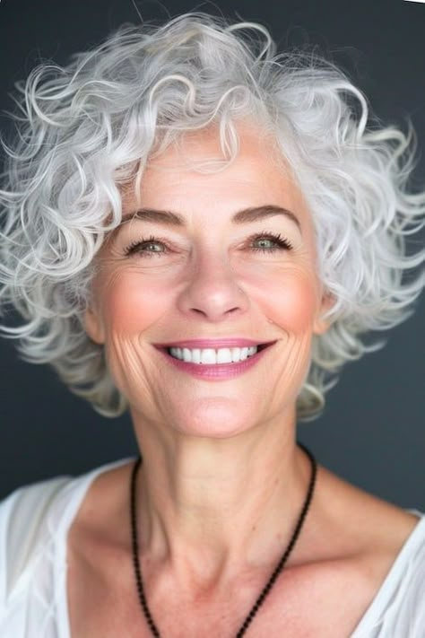 Curly Hairstyles For 60 Year Old Women, White Curly Hairstyles, Short Curly Gray Hair Over 50, Curly Gray Hair Over 50 Curls, Chin Length Curly Hair, Curly Bobs For Older Women, Platinum White Hair, Gray Curly Hair, Curly Silver Hair