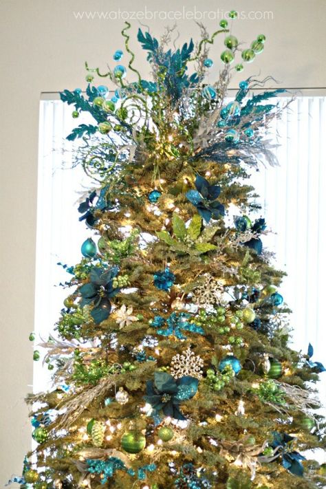 Peacock Lime and Turquoise Christmas Tree from A to Zebra Celebrations plus 31 Christmas Tree Patterns and Colorful Designs on Frugal Coupon Living. Candyland Tree, Turquoise Christmas Tree, Peacock Christmas Tree, Peacock Christmas, Turquoise Christmas, Santa Tree, Tree Snowman, Blue Christmas Tree, Snowman Tree