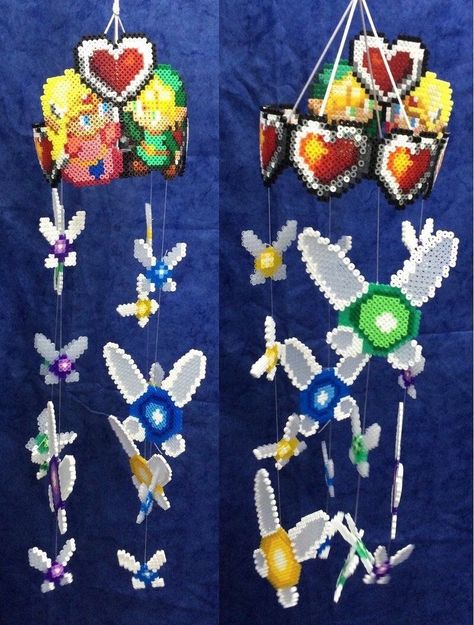 Legend of Zelda perler bead baby mobile Geeky Craft, Perler Creations, Nerd Crafts, Art Perle, Perler Art, 8bit Art, Fusion Beads, Perler Crafts, Geek Crafts