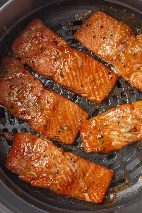 The most delicious air fryer salmon with a mouthwatering maple glaze. If you love seafood with savory-sweet flavor, this recipe is for you. Air Fryer Fish Recipes Salmon, Candied Salmon Air Fryer, Air Fryer Honey Glazed Salmon Recipes, Salmon Cooked In Air Fryer, Salmon Marinade Air Fryer, Maple Salmon Air Fryer Recipes, Sockeye Salmon Recipe Air Fryer, Air Fried Salmon Recipe, Glazed Salmon Air Fryer