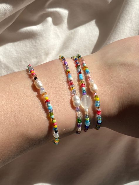 pearl bracelet multicolour bracelet summer aesthetic small business Aesthetic Bracelet Stack, Small Beaded Bracelets Aesthetic, 90s Bracelets, Beaded Bracelets Aesthetic, Small Bead Bracelets Ideas, Bratz Summer, Indie Necklaces, Summer Bracelet Stack, Sticker Ig