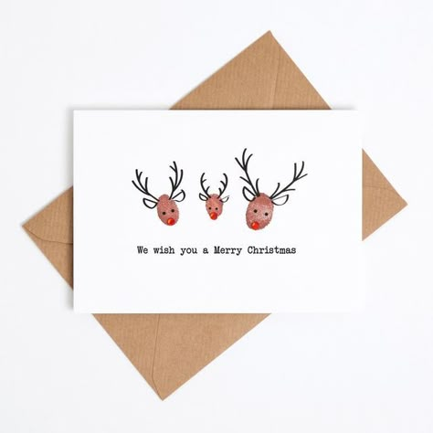 Casey | Card Making Kits on Instagram: "My red nose reindeer, four Christmases in and still your favourite ❤️ this was the first Christmas card I ever created for our family and we have sent it every year since 2017. This year I am wondering if I might dare to break with tradition and send the sprouts instead but that feels a pretty radical change🥬 I started making cards for others in 2019 when I opened festive fingerprints but the cards had been a tradition in our house for two years previous. Fingerprint Reindeer, Toddler Christmas Cards, Christmas Fingerprint, Handprint Christmas Cards, Reindeer Christmas Cards, Baby Christmas Crafts, Baby Christmas Card, Reindeer Christmas Card, Fingerprint Cards