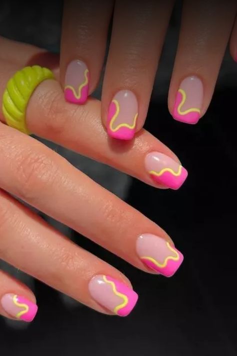 Get ready to make a statement with these vibrant neon nails for summer! Embrace the bold and bright colors that will perfectly complement your summer outfits and beach vibes. Stand out and express your fun personality with these eye-catching nail designs. Whether you prefer neon pink, green, orange, or yellow shades, there's a stunning option for everyone. Switch up your manicure game this season and let your nails do the talking. Bright Nails Designs Neon Art Ideas, Simple Vibrant Nails, Neon Pink And Yellow Nails Art Designs, Neon Nail Inspo Acrylic, Short Neon Nail Designs, 80s Nails Designs Simple, Pink Lemonade Nail Designs, Pink Yellow And Orange Nails, Orange And Hot Pink Nails