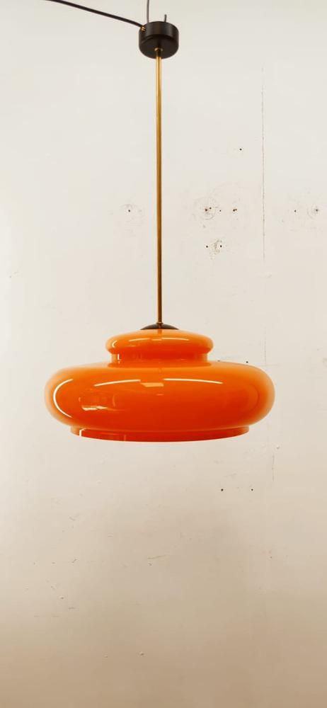 Orange Polycarbonate Pendant Lamp | Chairish Wall Mounted Pendant Light, Cool Living Room Lighting, Apartment Lamps Living Rooms, Light Orange Kitchen Cabinets, 60s Light Fixtures, Orange Glass Pendant Light, Orange Ceiling Light, Mcm Dining Room Lighting, 70s Lighting Fixtures