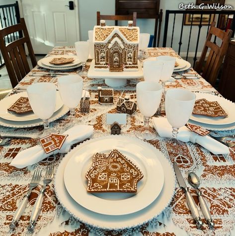 Gingerbread Houses on a Christmas Tablescape, more information about everything on this table setting and where it all came from in my blog post about it all here: https://www.whispersoftheheart.com/blog/2023/12/5/gingerbread-on-a-christmas-tablescape Gingerbread Theme Table Decorations, Gingerbread Place Setting, Gingerbread Dining Table Decor, Gingerbread Christmas Table Setting, Gingerbread House Tablescape, Gingerbread Table Setting, Gingerbread Table Decor, Gingerbread Kitchen Decorating Ideas, Gingerbread Tablescape