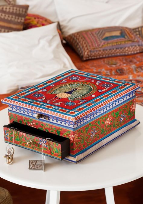 A beautiful handmade hand painted jewellery box, made from sustainable mango wood, this box has a top opening section and a single drawer; two compartments for storing your jewellery accessed with discreet round knobs. This will make a beautiful unusual gift for that special someone. Red, Blue and Multi Colours. Peacock Design. Dimensions - 27 cm x 22 cm x 11 cm Material - Mango Wood Hand Crafted Carpet Design Pattern, Hand Painted Jewellery, Painted Jewellery, Painted Jewelry Boxes, Multicolor Jewelry, Painted Jewelry, Unusual Gift, Hand Painted Jewelry, Stationery Craft