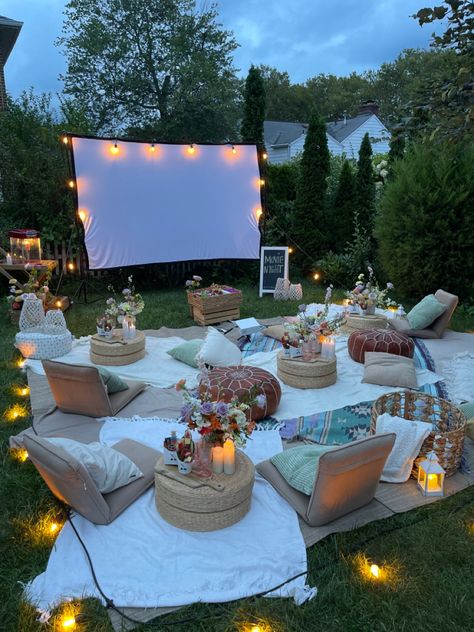 Warm tone movie night in the backyard with projecter and big screen. Backyard Movie Night Party, Sweet Sixteen Birthday Party Ideas, Movie Night Birthday Party, Backyard Birthday, Backyard Movie Nights, Backyard Movie, Movie Night Party, Fun Sleepover Ideas, Sleepover Things To Do