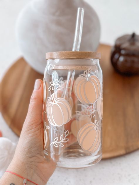 Boho Pumpkin Glass Cup 16oz glass beer can comes with a bamboo lid and straw. The bamboo lid includes a sleek proof silicone sleeve which seals your drink in the glasses and prevents leaks. Washing Instructions: Gently hand wash only with a non-abrasive sponge to prevent scratching. Not dishwasher safe. Not microwave safe. Do not soak/submerge. Clean with mild soap & water. Dry bamboo lids right away. Clean straw with a brush. Glass Cups With Vinyl Cute Ideas Fall, Pumpkin Glass Cup, Tumbler Pictures Ideas, Boho Glass Cups, Christmas Beer Can Cup, Glass Coffee Cup Design, Glass Tumbler Design Ideas, Can Glass Cup Design, Glass Cup Design Ideas