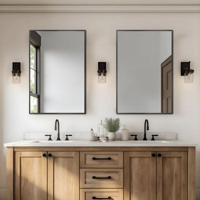 Transform your interior with the sleek and contemporary look of our Rectangle Metal Wall Mirrors, available in a set of two. These mirrors are the perfect fusion of functionality and style, designed to enhance the aesthetic of any space with their clean lines and metallic finish. Whether you're decorating a modern urban loft or a cozy country home, these mirrors offer a versatile solution for brightening up your walls and expanding visual space. With their robust construction and elegant design, Modern Farmhouse Bathroom Double Vanity, Bathroom Vanity Two Mirrors, Double Vanity Mirrors And Lights, Double Sink Mirror Ideas, Brown Cabinets Bathroom, Black White And Gray Bathroom, Double Vanity Mirror Ideas, Modern Farmhouse Master Bath, Modern Traditional Bathroom