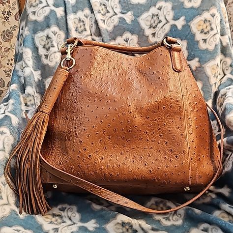 Large Nwot Bag By Gili (Got It Love It) Ostrich Embossing Beautifully Done, Large Tassel, Gold Hardware, Removable Adjustable Strap And Shorter Round Handles. 2 Slip Pockets And One Zip Pocket Inside. Clip Can Cinch In To Change Shape (See Pics)