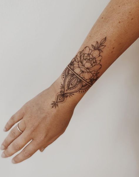 Floral Mandala Wrist Tattoo, Women’s Wrist Wrap Tattoo, Wrist Tattoo Unique, Forearm Bracelet Tattoo Women, Inside Of Wrist Tattoo, Ornamental Tattoo Wrist, Women Wrist Tattoos Ideas, Outside Wrist Tattoos For Women, Top Wrist Tattoo