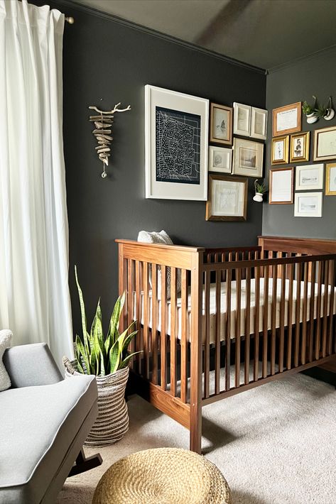 Charcoal Nursery Walls, White Gray And Brown Nursery, Gender Neutral Moody Nursery, Urbane Bronze Nursery, Nursery Dark Wood Floors, Brown And Grey Nursery, Nursery Dark Walls, Dark Accent Wall Nursery, Dark Cozy Nursery