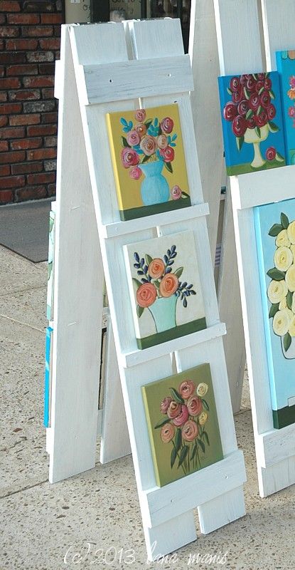 shutter easel lana manis Displaying Coasters For Sale, Creative Ways To Display Artwork, Backyard Boutique Ideas, Vertical Display Ideas, Outdoor Display Exhibition, How To Display Vinyl Decals To Sell, Diy To Sale, Car Charm Vendor Display, Diy Trade Show Display