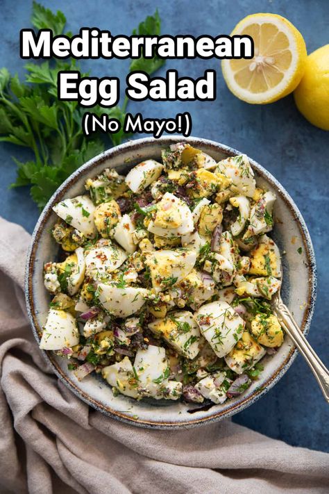 Enjoy this healthy egg salad with a Mediterranean twist that's ready in 20 minutes. This no mayo version gets its bright flavors from herbs, olives and zesty feta. This recipe is as easy as chop and mix! You can even cook the eggs a couple of days in advance and make the salad when you're ready. Egg Salad With Cucumber, Mediterranean Egg Salad Recipe, Salads With Boiled Eggs, Greek Egg Salad, Egg Salad Recipe Without Mayo, Salads With Egg, What Goes With Egg Salad, Pesto Egg Salad, Eggs And Olives