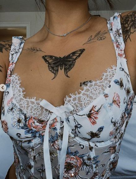 Moth Tattoo Chest Woman, Whimsical Chest Tattoo, Fine Line Traditional Tattoo, Chest Tattoo Female Butterfly, Moth Chest Tattoo Female, Butterfly Chest Tattoo Female, Goth Women Tattoos, Butterfly Sternum Tattoo, Butterfly Chest Tattoo