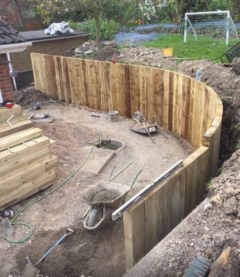 Curved new railway sleeper wall Curved Retaining Wall, Wooden Retaining Wall, Railway Sleepers Garden, Sleeper Wall, Sleeper Retaining Wall, Sleepers In Garden, Wood Retaining Wall, Garden Retaining Wall, Railway Sleepers