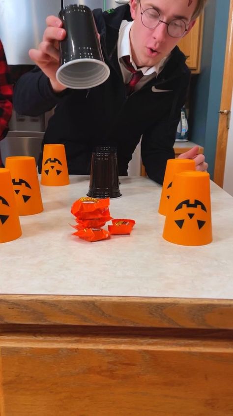 Halloween Party Game -- Cup Roulette 🎃 | Halloween Party Game -- Cup Roulette 🎃 Kids, Dad, and family play easy diy party game with pumpkin cups and candy prizes. Perfect game for halloween and... | By Benson Bros | Facebook Halloween Punch Cup Game, Halloween Prizes For Kids Games, Halloween Games For Family, Benson Bros, Easy Halloween Games, Halloween Prizes, Diy Party Games, Halloween Punch, Pumpkin Cups