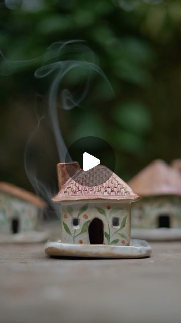 Shibani | Ceramic Art and Decor on Instagram: "Dhoop huts 🛖 Taking you behind the scenes into the making of these beautiful, rustic houses today. They’re made to be used as incense stick or tealight holders and they were on my to-make list for the longest time! This was a custom order from dear friends of ours, and their only brief to us was to get as creative with these houses as we’d like!   @kajari.p and @durgashahane poured their hearts into handbuilding these houses and the result was a set of 30 entirely unique houses, each with its own quirks and style! The experimentation didn’t end there - we played around to our hearts content with several different glazes at @studio_ceramatrix , resulting in even more variety. Finally, the houses were ready for the final overglaze touch - witho Rustic Houses, Ceramics Inspiration, Ceramic Incense Holder, Pottery Handbuilding, Rustic Ceramics, Unique Houses, Incense Sticks, Incense Holder, Hand Built