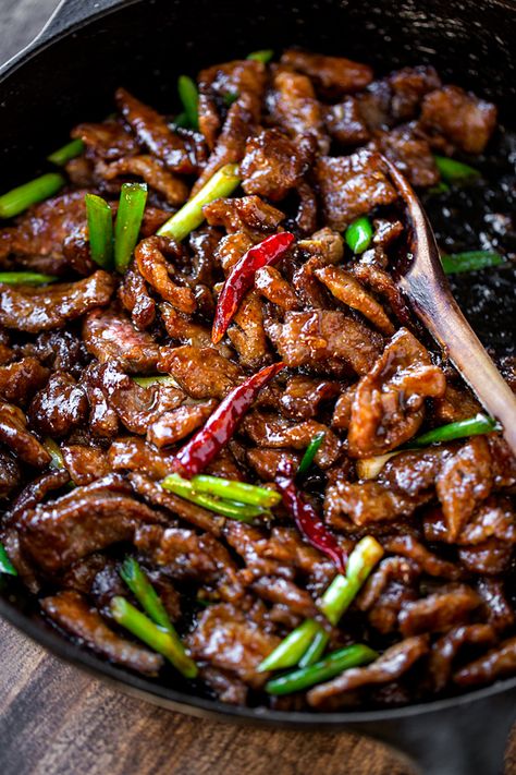 Perfectly sweet and savory, this Mongolian beef is generous on the flavor, and cooks up quickly for a delicious better-than-restaurant quality meal at home! | thecozyapron.com #mongolianbeef #mongolianbeefrecipe #asianrecipes #beefrecipes #recipesfordinner #recipesfordinnereasy #recipeseasy Crockpot Recipes Beef Stew, Mongolian Beef Recipes, Best Beef Recipes, Mapo Tofu, Diner Recept, Mongolian Beef, Ballgown Wedding, Beef Recipe, Beef Recipes Easy