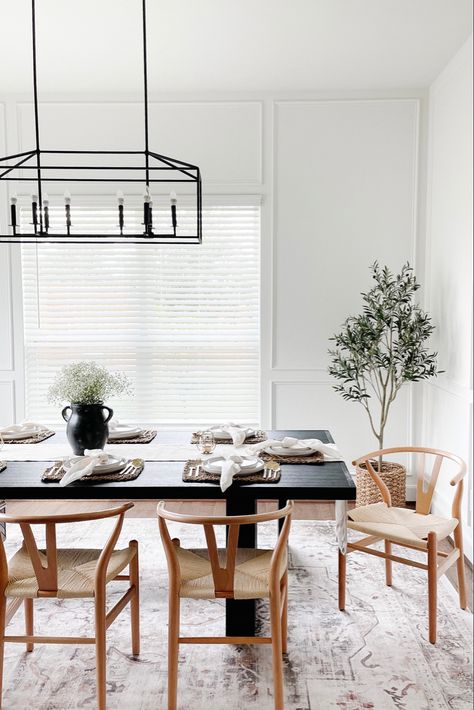 Neutral Dining Room with Black Dining Table and Wood Wishbone Dining Chairs. Washable Ruggable Rug. Sarrah Hazel Ruggable, Ruggable Living Rooms, Wishbone Chair Dining Room, Wishbone Chair Dining, Rug Under Table, Poly And Bark, Black Dining Table, Dinning Room Rug, Neutral Dining Room