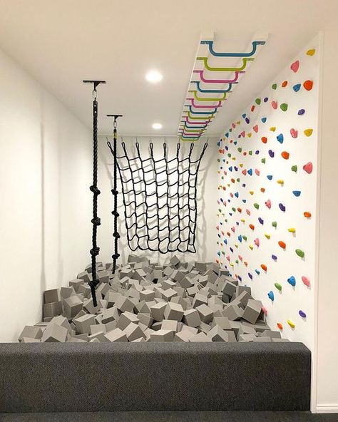 Playroom With Foam Pit, Fun Home Interior, Playground In Basement, Indoor Playroom Design, Kids Indoor Climbing Ideas, Cool Playroom Ideas Modern, Slide In A House, How To Build A Foam Pit, Swings In Basement