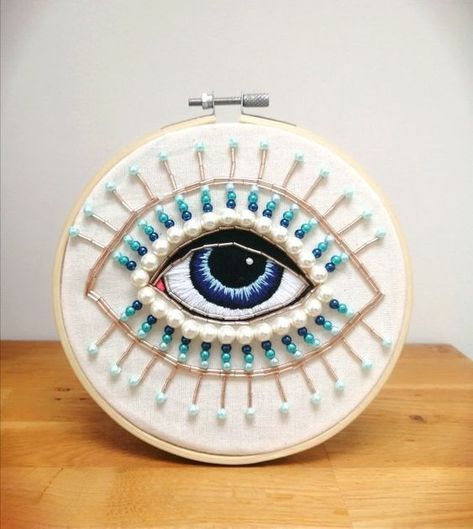 Heidi Hummingbird Evil Eye symbol spiritual bead embroidery hoop art kit #BeadingPatterns #SeedBeadPattern #SeedBeadPatternsAnimals #SeedBeadPatternsFlower Hoop Embroidery Pattern, Evil Eye Symbol, Evil Eye Design, Seed Bead Pattern, Eye Symbol, Stitch Guide, Hoop Embroidery, Bead Embroidery Patterns, Seed Bead Patterns