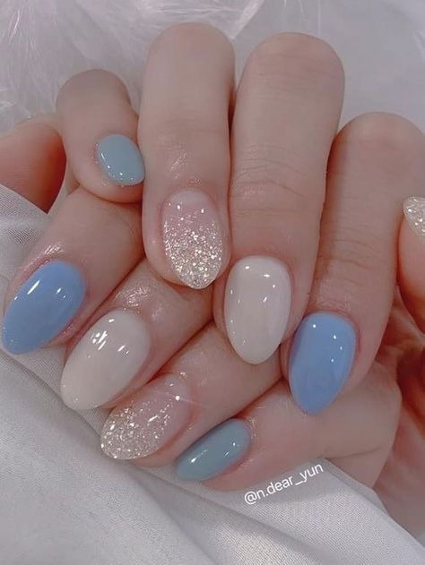 light blue nails: elegant Light Color Nails Short, Light Blue Nails Almond Short, Pale Blue Nail Designs, Light Blue And Light Pink Nails, Baby Blue Silver Nails, Colorful Bridal Nails, Light Blue Gradient Nails, Opal Blue Nails, Light Blue Gel Nails Ideas