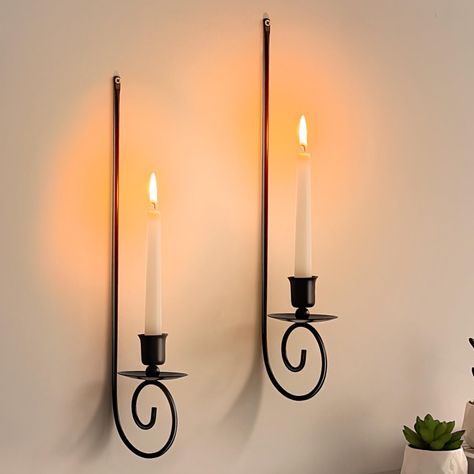 PRICES MAY VARY. Packaging lists:2Pack metal wall candle holder(candles are not included),size measure about 14.9x3.5x2.7in/38x9x7cm,suitable for 1.18 inch candles and LEDs taper candles. Only includes wall candle sconces, not candles. Quality materials:Wall candle holder are made of high quality metal,black coating on the surface,not faded or rusted easily, can provide longer service time. Retro wall sconce decoration: This iron hanging candle holder combines artistry and practicality perfectly Sconces In Bathroom, Modern Candle Sconces, Metal Wall Candle Holders, Fireplace Wedding, Hanging Candle Holders, Black Candlestick Holders, Wall Candle Sconces, Brighton Townhouse, Wall Hanging Candle Holders