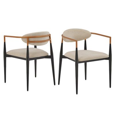 Arriving as a 2-piece set, this armchair is a great way to bring lots of mid-century flair to your dining area. It has a slender, tubular metal frame with a two-tone finish of copper and black. And the barrel back design adds even more modern style to your main hangout space. An upholstered backrest and matching seat come in a muted light tone, and they're both filled with foam to provide just the right amount of support as you sit over coffee and dessert. Each chair in this set accommodates 250