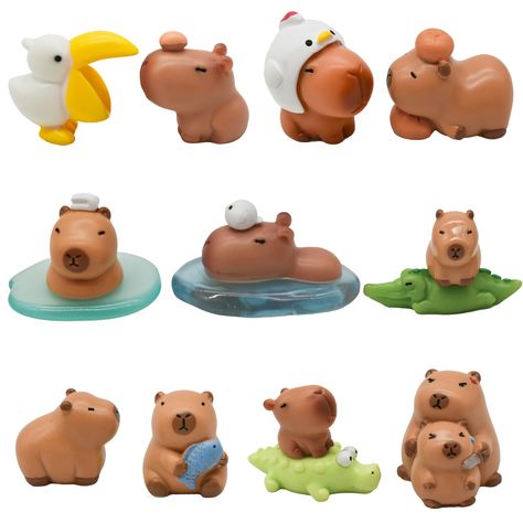 PRICES MAY VARY. Package: Pack of 10 pieces different styles mini capybara figurines+2 pieces mini crocodiles+1 piece mini pelican+1 piece mini pond Material: These cute small capybara figurines are made of resin, durable and well-made, safe, non-toxic and stylish Size: Capybara cake toppers approx. 1-2 inches/2-4 cm; Each pose has different sizes, small and delicate, very adorable Realistic Design: The tiny capybaras have different poses, sitting, standing, holding a fish, lying on persimmons, Polymer Clay Mini Scenes, Cute Clay Capybara, Capybara Clay Sculpture, Cute Animal Figurines, Cute Clay Miniatures, Mini Clay Ideas Animals, Polymer Clay Useful Items, Capybara Clay Art, Little Things To Make Out Of Clay