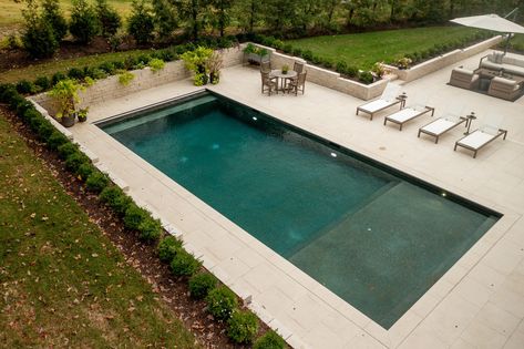 Rectangular Pool with Large Tanning Shelf and Autocover - St. Louis' Premier Pool Company Vinyl Liner Pool With Tanning Ledge, Fiberglass Pool Ideas Backyards, Rectangle Pool With Spa And Sun Shelf, Pool With Hot Tub And Tanning Ledge, Rectangle Pool Ideas, Rectangle Pool With Tanning Ledge, Rectangle Pool With Spa, Modern Rectangle Pool, Modern Pool Design