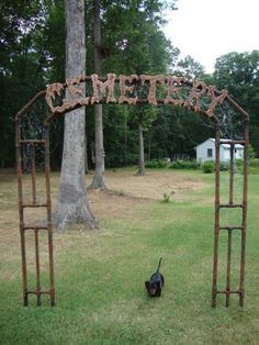 Here is the one I made to go with my pvc fence it is also pvc and the letters are made from 1" pink foam glued on 1/4" plywood so they would be strong enough to screw to the pvc pipe from the back side. It is 3 pieces the top and both side so that I can store it better. I did add to 2 foam skulls to the middle opening one on each side leg that is not shown in this picture and painted them the same color as the letters.Hard to see the arch but you can see the two solar power Cemetary Archway Diy, Diy Cemetery Fence, Cemetery Archway Diy, Pvc Pipe Arch Diy, Skull Archway Diy, Diy Halloween Arch, Halloween Archway Diy, Pvc Arch, Archway Ideas