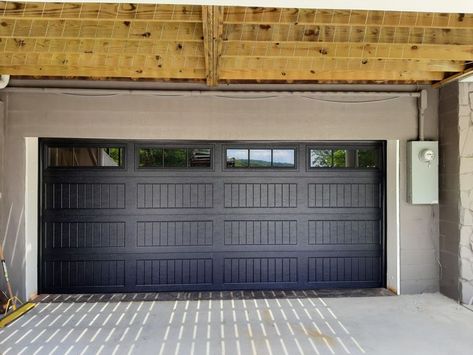 Black garage doors are making a come back! They are perfectly suited for that sleek modern vibe home as well as the modern day farmhouse. Find yours today! Modern Day Farmhouse, Trim Windows, Black Garage Doors, Black Garage, Garage Door Company, Garage Exterior, Door Company, Overhead Door, Types Of Doors