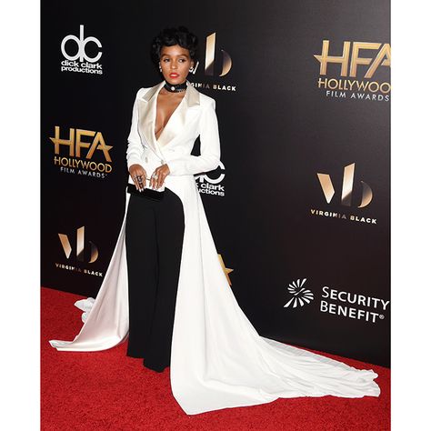 Janelle Monae made a dramatic entrance donning a white tuxedo jacket, which featured a stunning train, to the 20th Annual Hollywood Film Awards. Tuxedo Long Dress, Tux For Women, Male Bride, Womens Tuxedo Dress, Prom Suit And Dress, Rocker Wedding, Fem Fashion, Gown With Jacket, Dramatic Entrance