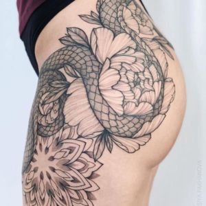 60+ Classy Side Thigh Tattoos: Insights, Meanings & Best Designs — InkMatch Cool Thigh Tattoo For Women, High Thigh Tattoo, Upper Thigh Tattoo, Thigh Tattoo Men, Side Thigh Tattoos, Garter Tattoo, Full Sleeves Design, Hip Thigh Tattoos, Tattoos For Men And Women