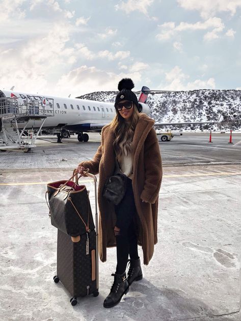 fashion blogger mia mia mine wearing a max mara teddy bear coat with louis vuitton combat boots at the aspen airport. click through to see more airport outfits with combat boots, how to travel in style, combat boots outfits for traveling, and chic travel looks. #combatboots #winteroutfit #winterfashion Aspen Outfit Winter, Aspen Trip, Airport Outfit Winter, Winter Vacation Outfits, Ski Trip Outfit, Apres Ski Outfits, Colorado Outfits, Mountain Outfit, Winter Travel Outfit