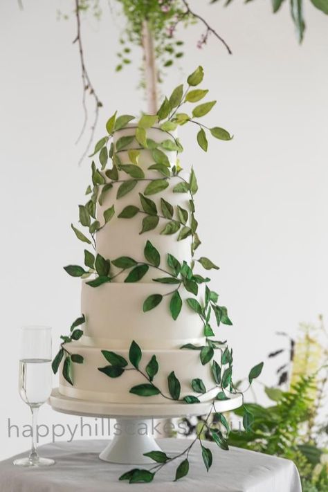 Green ombre leaf wedding cake by Happyhills Cakes - http://cakesdecor.com/cakes/241173-green-ombre-leaf-wedding-cake Leafy Wedding Cake, Plant Wedding Cake, Hunter Green Wedding Cake, Leaf Cake Design, Plant Themed Cake, Rainforest Cake, Leaf Wedding Cake, Woodland Cakes, Quilling Cake