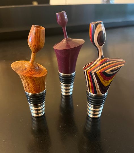 Bottle Stoppers Ideas, Wine Bottle Stopper Display, Wine Bottle Glass Holder, Wood Turning Bottle Stoppers, Wood Bottle Stoppers, Bottle Stopper, Off Centre Woodturning, Woodturning Art, Turned Art