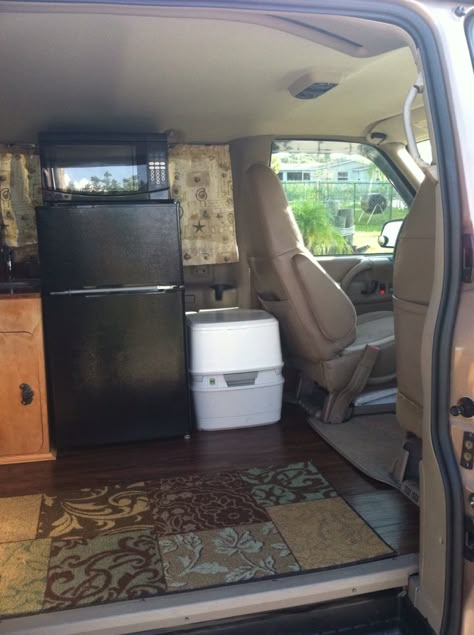 Custom RV Camper Van Stealth Conversion Van we built to be totally off grid with solar power and 25G freshwater tank. Built into a 2005 Chevrolet Astro Van by my husband and I. Fridge and freezer combo is powered by solar power, as well as the microwave. Porta Potti is self contained and easy to empty and clean. Chevy Astro Van Conversion, Astro Van Camper, Astro Van Conversion, Stealth Van, Promaster Camper Van, Cargo Van Conversion, Chevy Astro Van, Custom Rv, Kangoo Camper