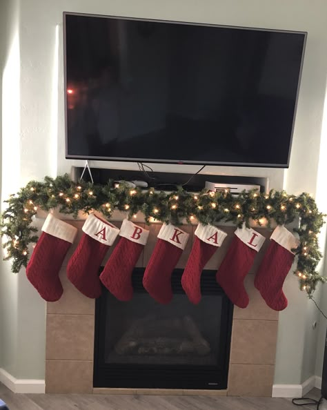 Stocking Fireplace Ideas, Christmas Stockings Ideas Hanging, Christmas Stocking Display, Paint Brick Fireplace White, Stockings On Fireplace, Christmas Stockings Fireplace, How To Decorate A Fireplace Mantel, Corner Fireplace Decor, Christmas Fireplace Mantels