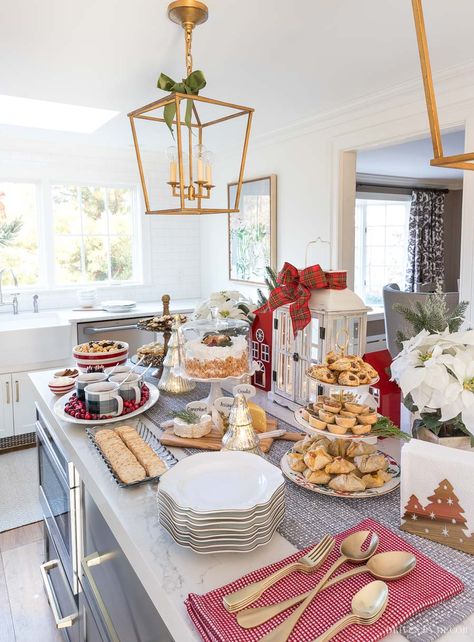 Holiday buffet of finger food set up on our kitchen island! #christmasbuffet #buffet #kitchenisland Tiered Food Display Buffet Tables, Christmas Island Food Display, Kitchen Island Buffet Set Up, Christmas Dinner Layout, Christmas Party Food Table Set Up, Christmas Party Island Decor, At Home Buffet Set Up, Christmas Buffet Tablescapes Display Food Tables, Christmas Party Home Decor